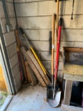 Contents of Corner (shovels, rakes, misc items on wall)