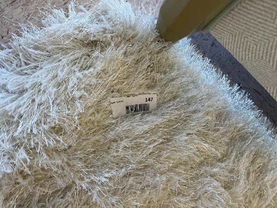 Daylyn Impact Ivory 5' x 7' Area Rug (Rug Only)