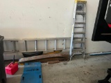 Misc lot of ladders and car dolly