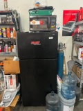 Hotpoint Refrigerator with Contents (microwave, cooktop, paint, water jugs, gas tank)