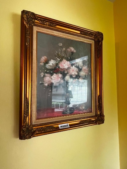 Artwork and frames in hallway