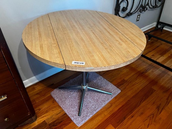 Round drop leaf table with chrome base