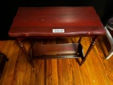 Dark wood small end table with magazine rack