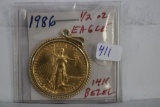 1986 1/2 ounce Gold Eagle in 14kt Gold Bezel