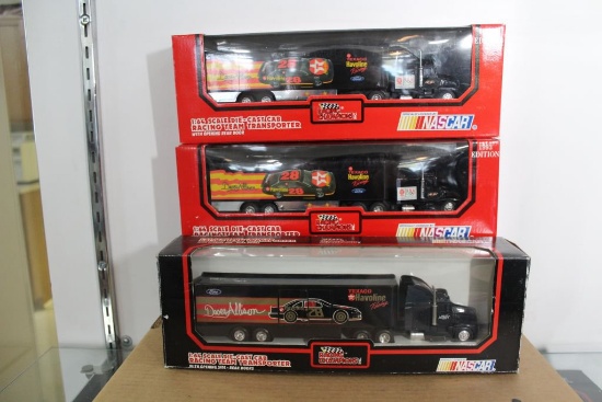 Three #28 Davey Allison Transporters