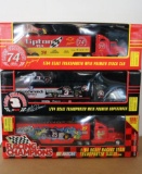 Three 1:64 Scale Transporters by Racing Champions