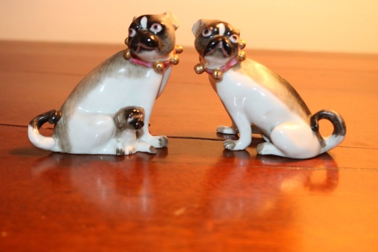 Two Small Porcelain Seated Pug Dogs