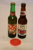 Two Beer Bottles, a Cook's 500 Ale and a Cook's Goldblume