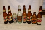 Seven Sterling Beer Bottles and One Tell City Bottle