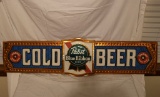 A Pabst Blue Ribbon Beer Strip Sign and a Fall City Beer Plaque with a Fish