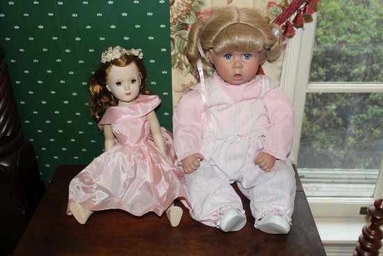 A Vintage Vinyl Doll, and a Porcelain Doll Marked Pat Secrest