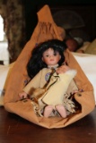 A Contemporary Porcelain Indian Doll w/ Papoose and Teepee