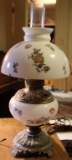 A Victorian Floral Decorated oil Lamp, Electrified