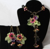 A Necklace and Earring Set