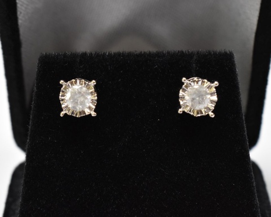 Large diamond stud earrings, 14 kt. gold