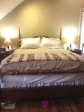 Four post wooden queen size bed