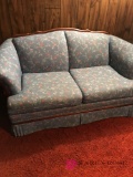 Blue flowered love seat