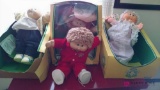 Four Cabbage Patch dolls