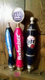 3 assorted beer taps