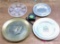 Four collector wall plate decorative items