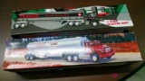 Two Texaco toy tanker trucks