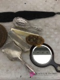 Silver colored brushes and comb beaded belt