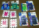 Assorted lot of handheld games, calculators, and picture frames