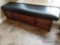 Wooden Bench with Patterened Black Cushioned Top