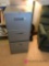 Three drawer file cabinet in office