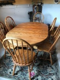 Oak table 6 chairs in dining room