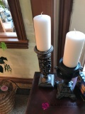 Decorative candle holders in family room