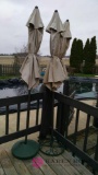 3 patio umbrellas with two bases