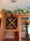 Two sets of decorative lighting grapes in kitchen