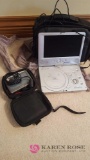 Polaroid DVD player portable and a TomTom- office