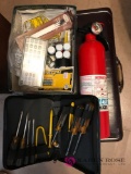 Briefcase, fire extinguisher, tool kit