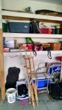 Contents of shelves in garage back wall