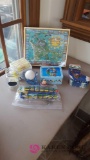 Kids puzzles and miscellaneous on back porch