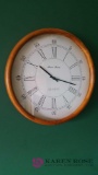 Round wall clock in front room