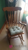 Wood rocking chair in front room