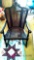 Cane bottom armed rocking chair