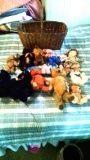 Wicker basket with vintage stuffed animals