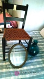 Chair, frame, and vase