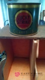 Lucky Strike advertising tins with shelf