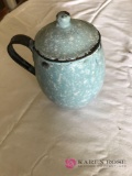 Light blue speckled granite ware cocoa mug