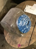 Blue swirl granite ware lid on glass jar