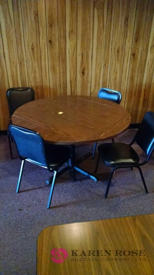 51 inch round Table with four cushioned chairs