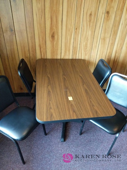 Brown table and 4 chairs.