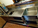 Industrial sized metal shelving unit and sink