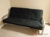 Metal fouton with black mattress