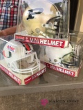 3 collectible mini college football helmets
